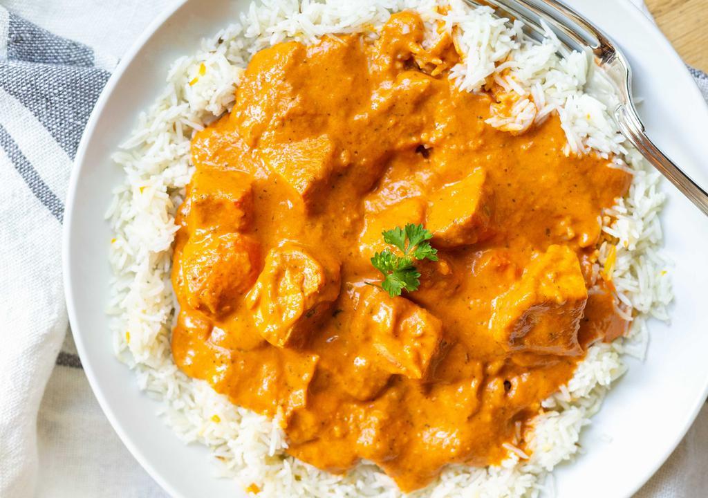 Chicken Tikka Masala · Our signature dish cooked with chicken breast in a creamy with a blend of our indian spices, garlic, and light ginger.