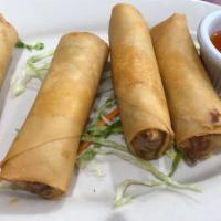Deep-Fried Spring Rolls (4Pcs) · Carrots, cabbage, & glass noodles wrapped in wonton wrapper; served with sweet & sour sauce.