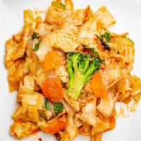 Drunken Noodles · Spicy level-1. Stir-fried wide rice noodles with eggs, cabbages, broccoli, carrots, yellow o...