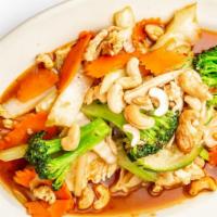 Pad Cashew Nut Chicken · Stir-fried chicken with cashews, green and yellow onions, carrots, zucchini, sweet chili pas...
