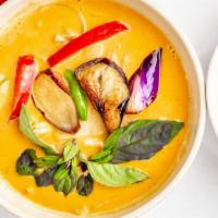 Panang Curry · Spicy level-1. Panang curry paste with coconut milk, eggplants, zucchini, bamboo shoots, oni...