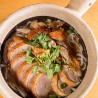 N2 - Duck Noodle Soup · Rice noodle with roasted duck in a light broth with bean sprouts, green onions and cilantro ...