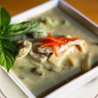 C1 - Green Curry · Cooked with green chili paste in coconut milk with eggplant carrots bamboo shoots red and gr...