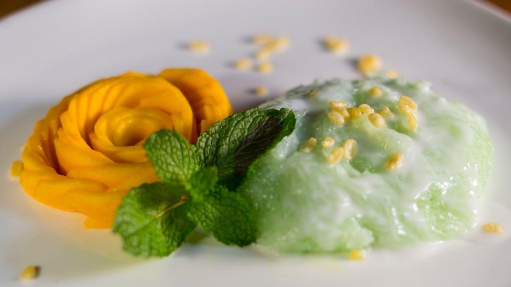 D1 - Sweet Sticky Rice With Mango · Steamed sticky rice doused in coconut milk served with fresh mango slices.