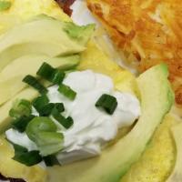 Baja Omelet · Diced bacon, tomatoes, green onions, pepper jack cheese, avocado slices and sour cream.   Se...