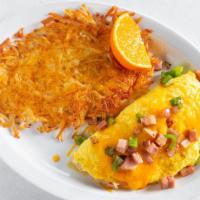Denver Omelet · Diced ham, red onion, bell peppers, and cheddar cheese.   Served w/ hash browns.