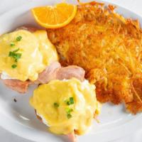 Eggs Benedict · Poached eggs on English muffin with ham and hollandaise sauce and side of hash browns.

***R...
