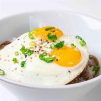 Loco Moco Bowl · 10 oz. House made patty, two sunny side up eggs, steamed rice, house made gravy and scallion.