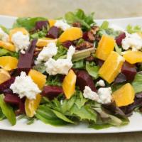 Beet Salad · Organic greens, oven roasted beets, fresh orange, walnuts, goat cheese, orange vinaigrette.