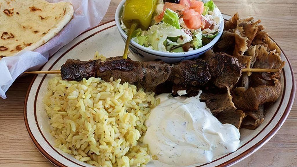 Greek Combo · A combination of gyros meat and your choice of souvlaki with tzatziki sauce. Served with Greek salad, pita bread, and choice of Greek roasted potatoes or rice pilaf.
