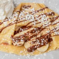 Gone Bananas Crepe · Crepe filled with fresh bananas and nutella. Nutella drizzle on the outside.