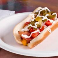 Hot Dog Regular  · Cinco de Mayo style.
Bacon ,cheese, tomato , onion mayonnaise and jalapeño slices.