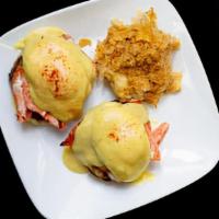 Salmon Benedict · Salmon on English muffin topped with poached eggs and hollandaise.