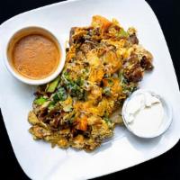 Ed'S Scramble · Eggs, roasted vegetables, caramelized onion, spinach, cheddar and jack cheeses, sour cream a...