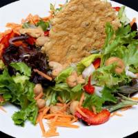 Thai Salad · Thai salad spring mix, basil, shallots, red pepper, and cashews.