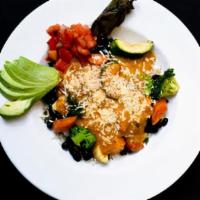 Mexican Ranchero Bowl · Rice, black beans, roasted vegetables, ranchero sauce, cotija cheese, and roasted jalapeños.