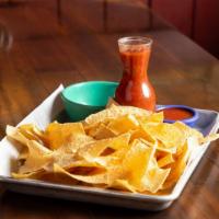Large Bag Of Chips & A Pint Of House-Made Salsa · Thinly sliced and crispy. dip made from tomatoes and onions.