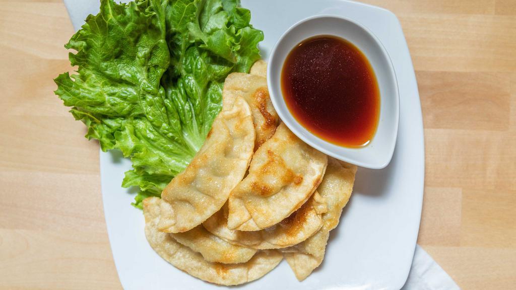 Chicken Dumplings · Deep-fried ground chicken & vegetable dumplings, sweet soy sauce