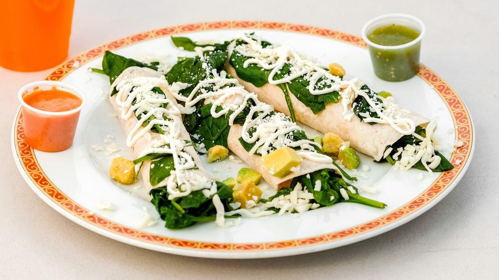 Corn/Spinach Crepes · 3 thin pancakes filled with corn or spinach  and mozzarella cheese,, peppers and salsa