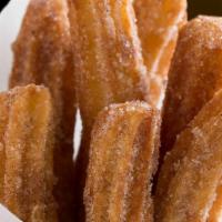 Order Of Churros · 2 Spanish dough sticks covered in cinnamon and sugar.