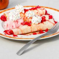 Sweet Crepes · 3 thin pancakes filled with cream cheese and strawberries or nutella and banana. Topped with...