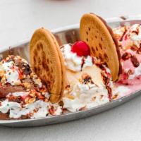 3 Marias Ice Cream · 2 Marias cookies served with 3 ice cream scoops and topped with whip cream, strawberry, choc...