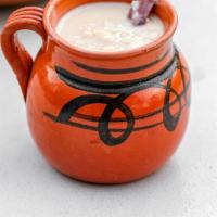 Arroz Con Leche  Atole · Hot drink made with rice, milk, cinnamon, and vanilla.