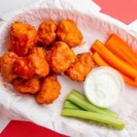 Vegan Wings · Baked seitan, served with carrots, celery, and your
 choice of dipping sauce.
