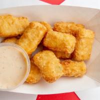Mac-N-Cheese Bites · Six cheese mac-n-cheese deep fried served with our own habanero ranch sauce.