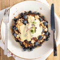Blueberry Pancake · Fresh blueberries, lemon curd, sliced toasted almonds, maple syrup