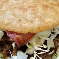 Arepa Llanera · Fried or roasted arepa, beef on a stick, queso e' mano, crumble cheese and tartar sauce / ar...