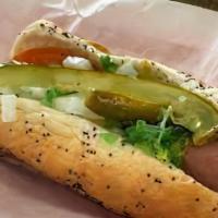 Jumbo Chicago Dog · Mustard sweet relish, diced onions, poppy seed bun, two sliced tomatoes, spear Kosher dill p...