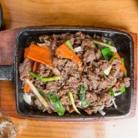 Bul Go Gi · Popular Item. Thinly sliced beef and vegetables with soy flavored broth or bbq style.