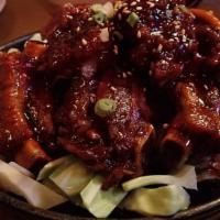 Spicy Pork Rib · Grilled baby back rib marinated with Korean spicy sauce.