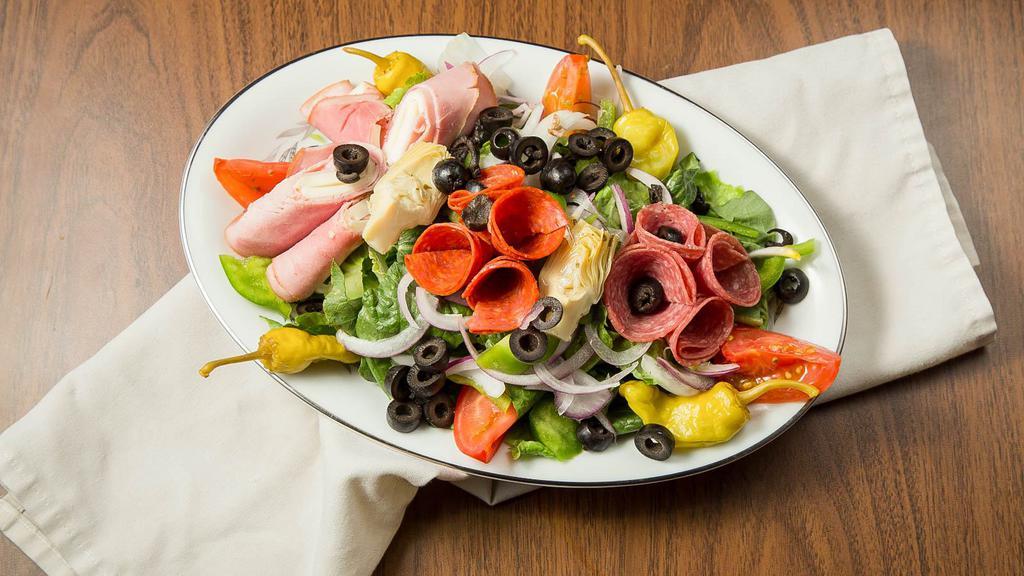 Antipasto Salad · Ham, salami, pepperoni,mortadella, romaine lettuce, onions, bell peppers, tomatoes, pepperoncini, mozzarella cheese, black olives & artichoke hearts.
