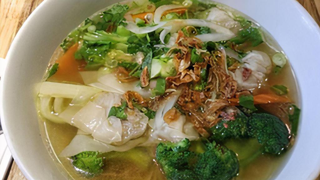 Wonton Noodle Soup · Handmade pork and shrimp wonton with a variety of vegetables served over fresh egg noodles in fragrant chicken broth.