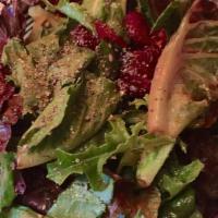 The Starter · A simple salad of seasonal greens, organic carrots and dried cranberries-dressed with raspbe...
