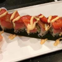Lehi Roll · Shrimp tempura, avocado topped with spicy tuna, lime, strawberry and eel sauce.
