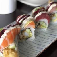 Avalanche Roll · Shrimp tempura, spicy tuna, cucumber inside, super white tuna, avocado, jalapeno on top with...