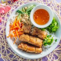 B-24.) Egg Roll Rice Vermicelli / Bun Cha Gio · Crispy egg rolls, lettuce, cucumbers, bean sprouts, herbs, peanuts, and pickled carrot