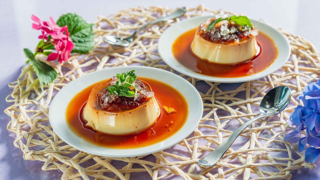 Vietnamese Style Flan · Homemade vanilla and egg custard topped with crème caramel .