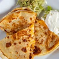 Cheese Quesadilla · A 12’’ flour tortilla stuffed with cheddar & Jack cheese, 
grilled to a golden crisp and ser...