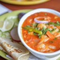 Tequila Shrimp Bowl · Shrimp sautéed in our delicious house ranchera sauce with chilies, onions, and a splash of r...