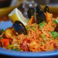 Mexican Paella · A customer favorite! Steamed mussels, pork chorizo, tender chicken breast, shrimp & lobster,...