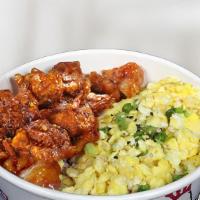 Jamaican Chicken Over Rice · Mild. Jamaican Chicken and scrambled eggs, green onion, sauce on steamed rice.
