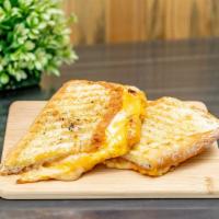 Grilled Cheese Panini · Cheddar Spread, Sharp Cheddar and Provolone. Served on Ciabatta.