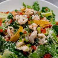 Caesar Con Ceviche · Our Caesar salad topped with lime-marinated prawns.

Consuming raw or undercooked meats, pou...