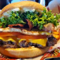 Morning Burger · American cheese, HopsnDrops spread, hard fried egg, bacon, lettuce and tomato.