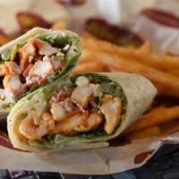 Buffalo Chicken Wrap · Hand breaded, boneless Buffalo chicken fingers wrapped together with romaine, tomatoes, bleu...