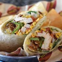 Bbq Chicken Wrap · Grilled chicken breast wrapped up in a garlic tortilla with ranch dressing, cheddar cheese, ...